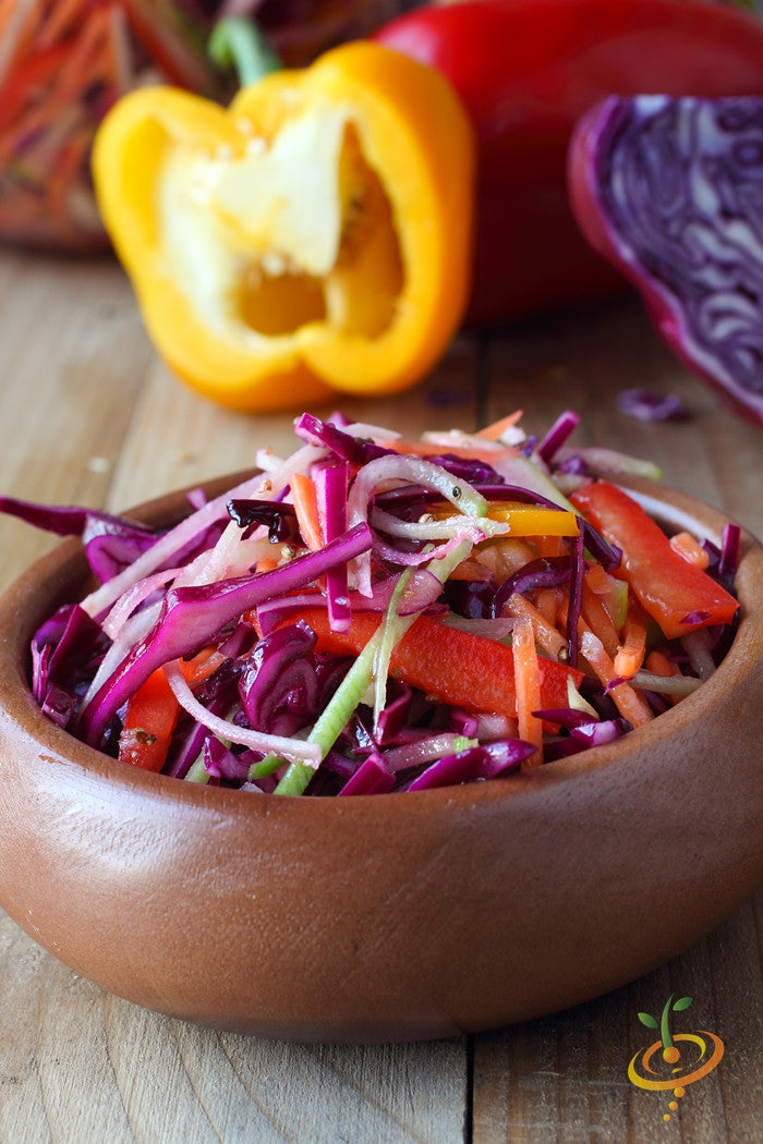 Red Acre cabbage seeds from SeedsNow, showing vibrant red cabbage seeds in a close-up image.